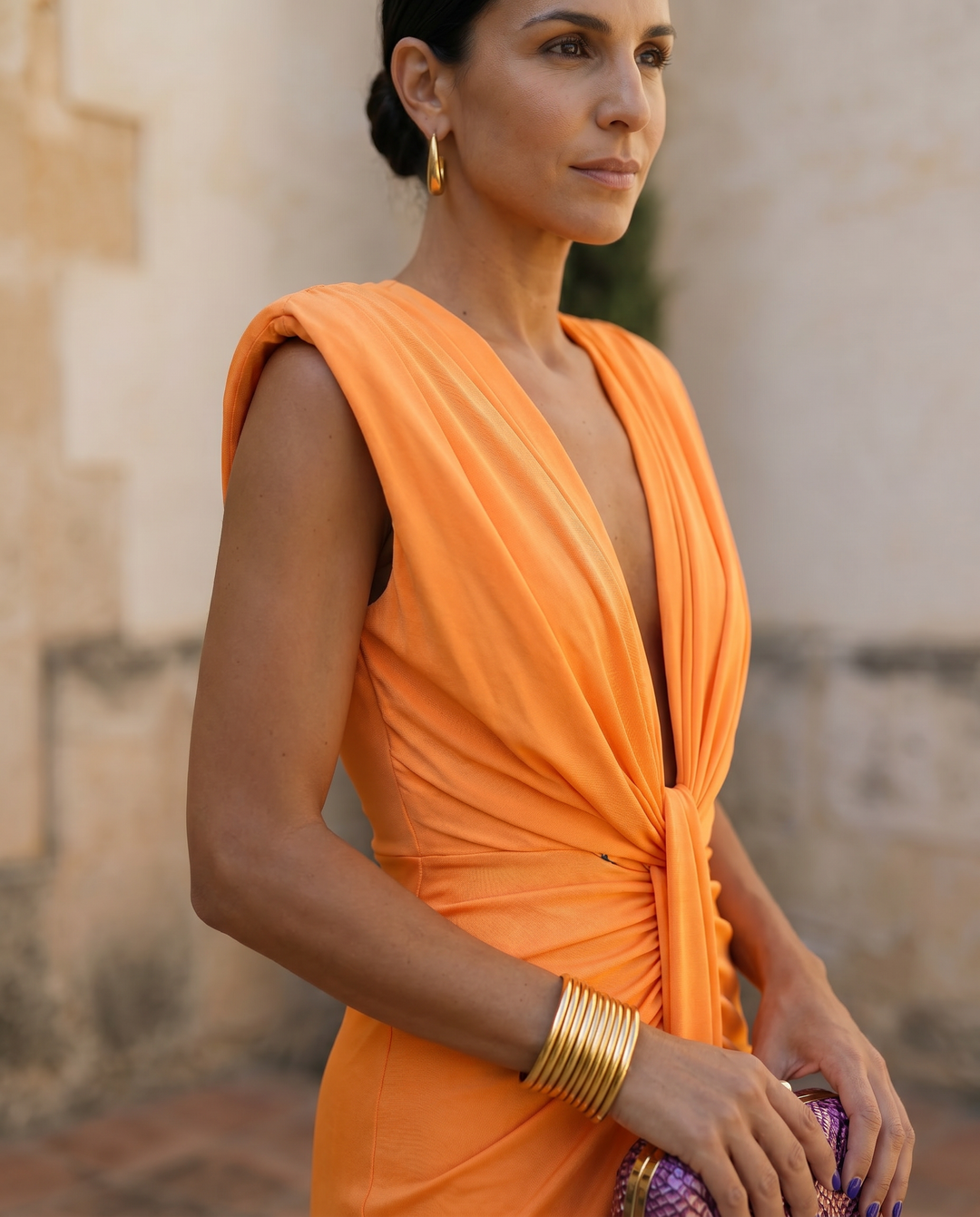 Magnificent fiery red draped dress by Emma & Rose Cape Town, featuring elegant flowing fabric and stylish design.