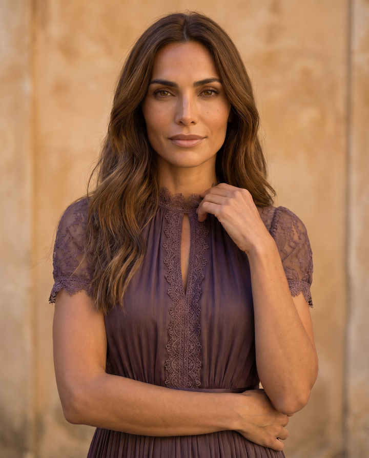 Long purple chiffon lace trim dress with keyhole neckline by Emma & Rose Cape Town, shown with elegant flowing fabric.