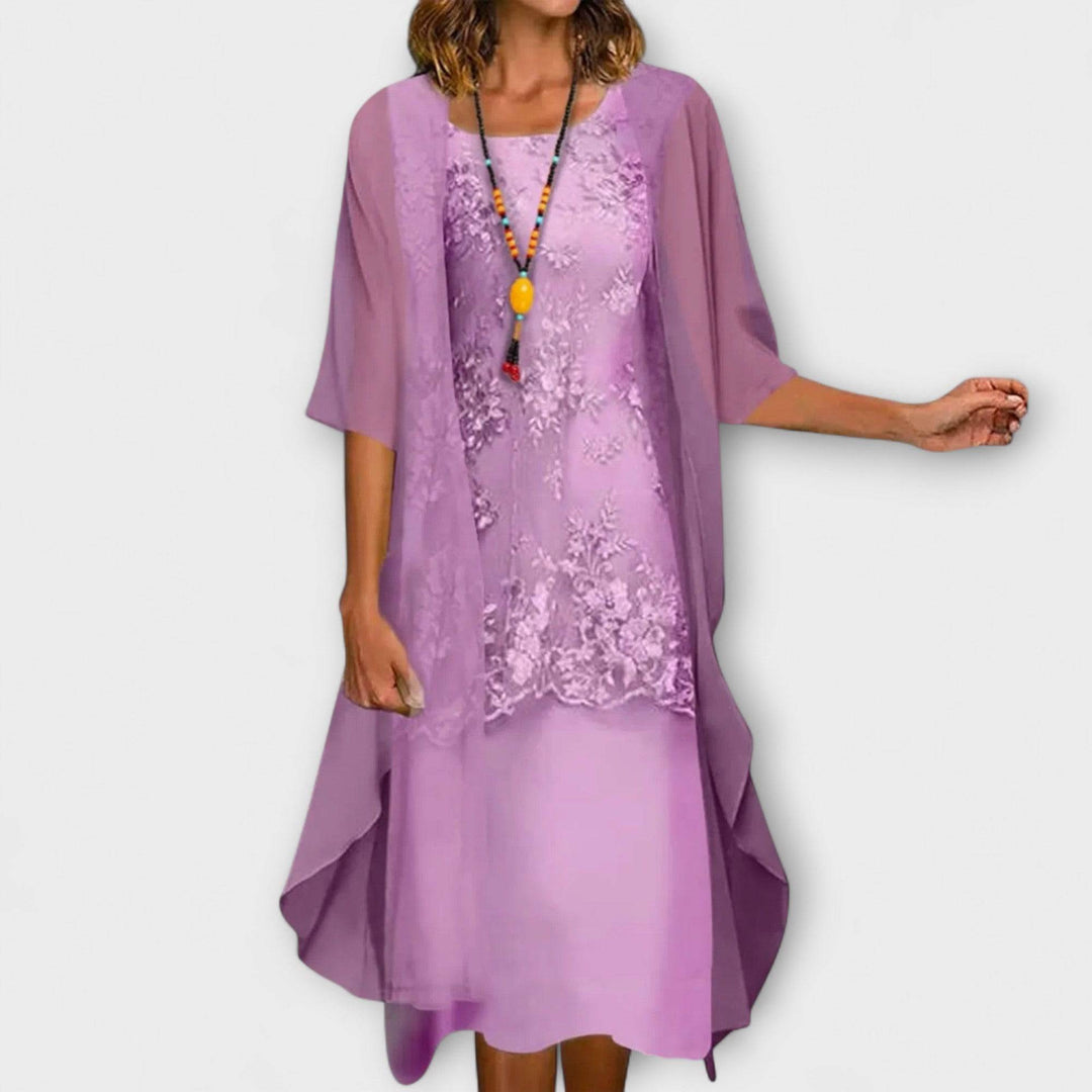 Elegant Penliah™ dress by Emma & Rose Cape Town featuring a stylish design and flowing fabric, displayed on a mannequin.