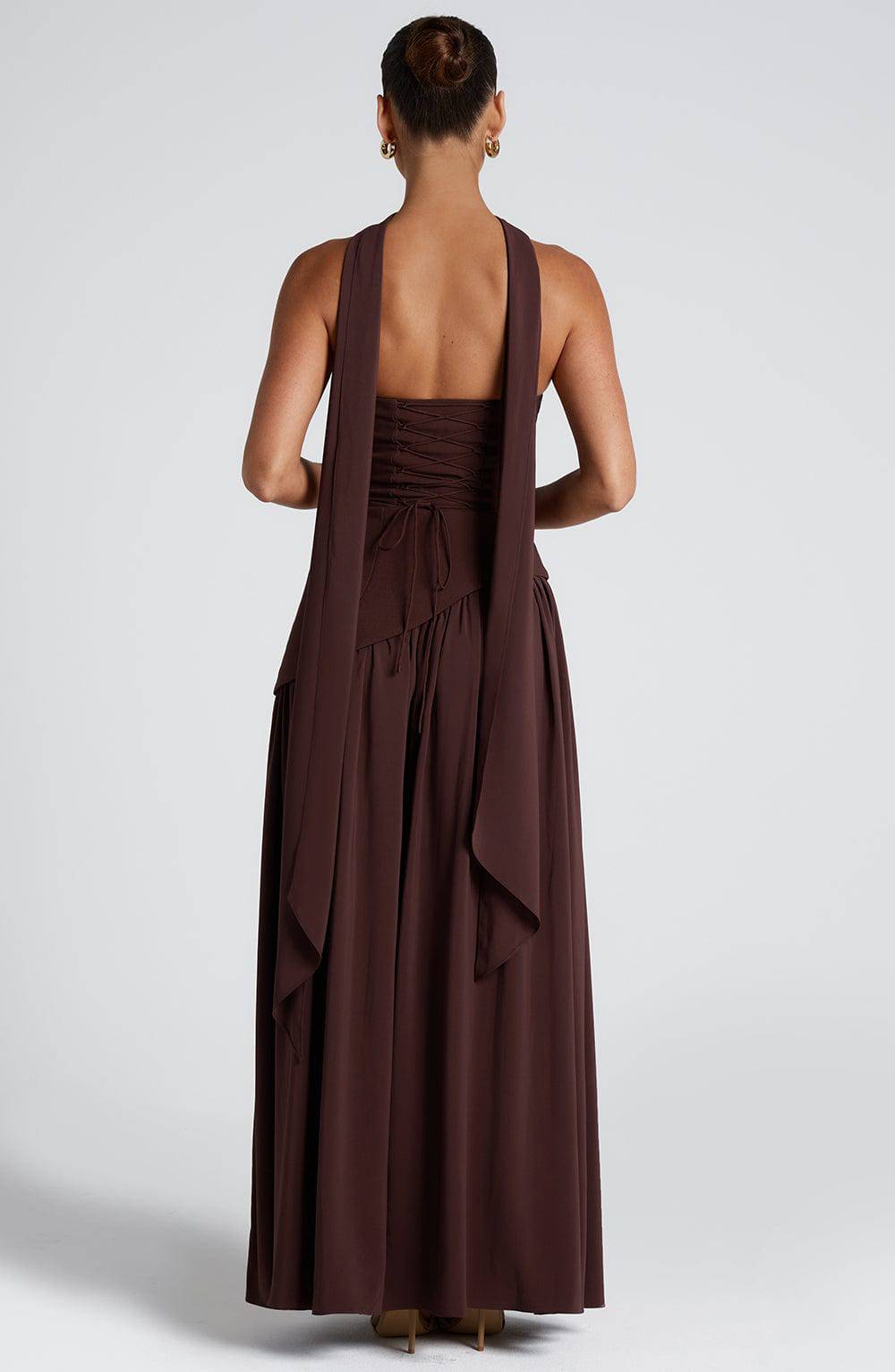 Marisela™ Emma & Rose Cape Town plum-brown maxi dress with elegant flowy fabric and sophisticated design, worn by a model.