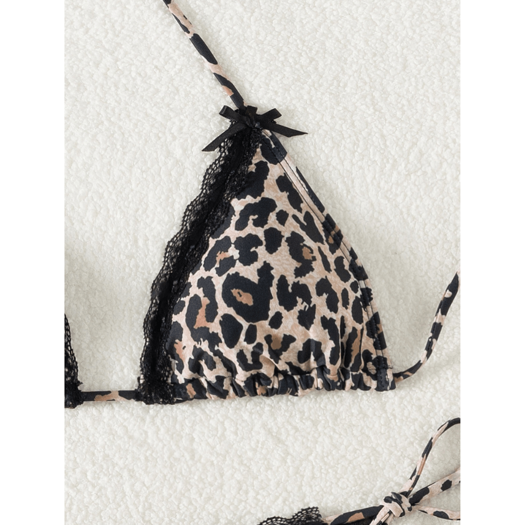 Midnight™ Safari Bikini by Emma & Rose Manhattan featuring a stylish animal print bikini top and bottoms.