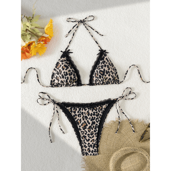Midnight™ Safari Bikini by Emma & Rose Manhattan, featuring a stylish animal print bikini top and bottom on a model.