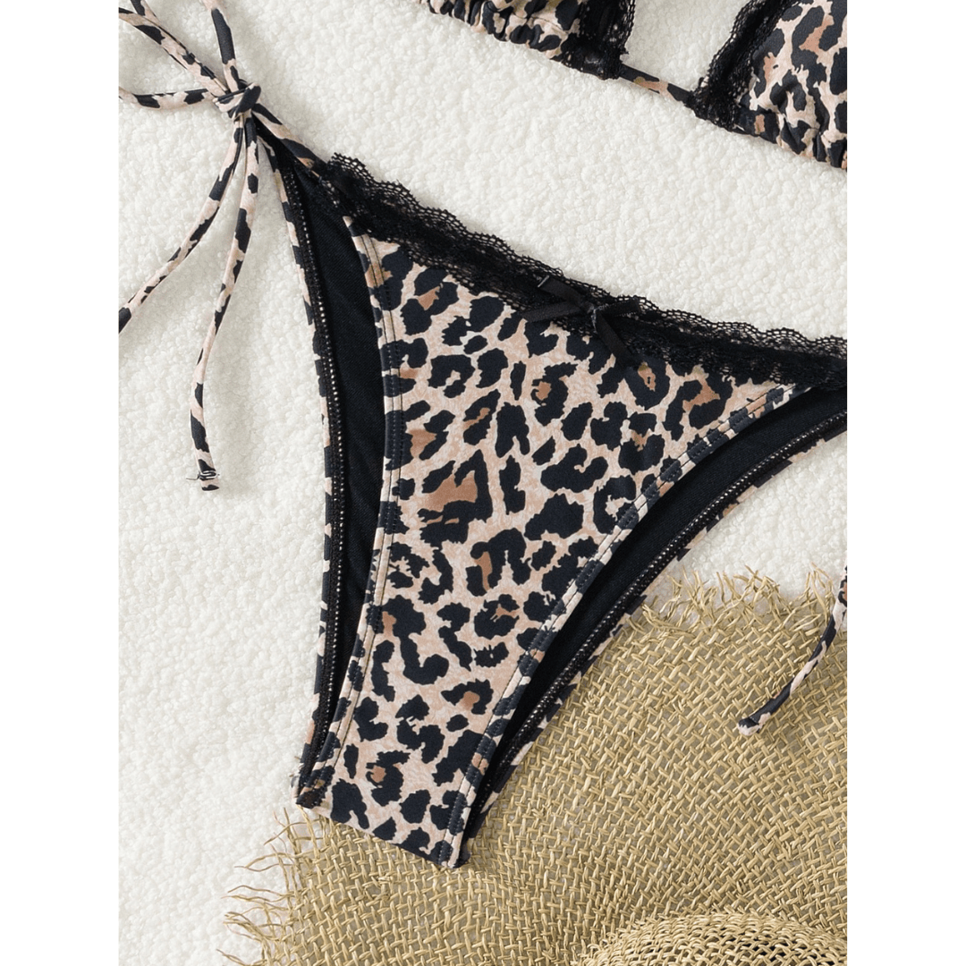 Midnight™ Safari Bikini by Emma & Rose Manhattan featuring a stylish printed bikini top and matching bottoms on a mannequin.