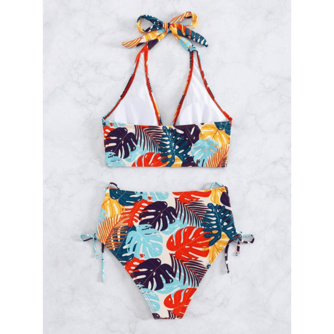 Exotic™ Oasis bikini set by Emma & Rose Manhattan featuring a colorful tropical print and adjustable straps.