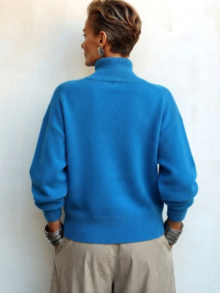 Elegant asymmetrical buttoned turtleneck sweater for women