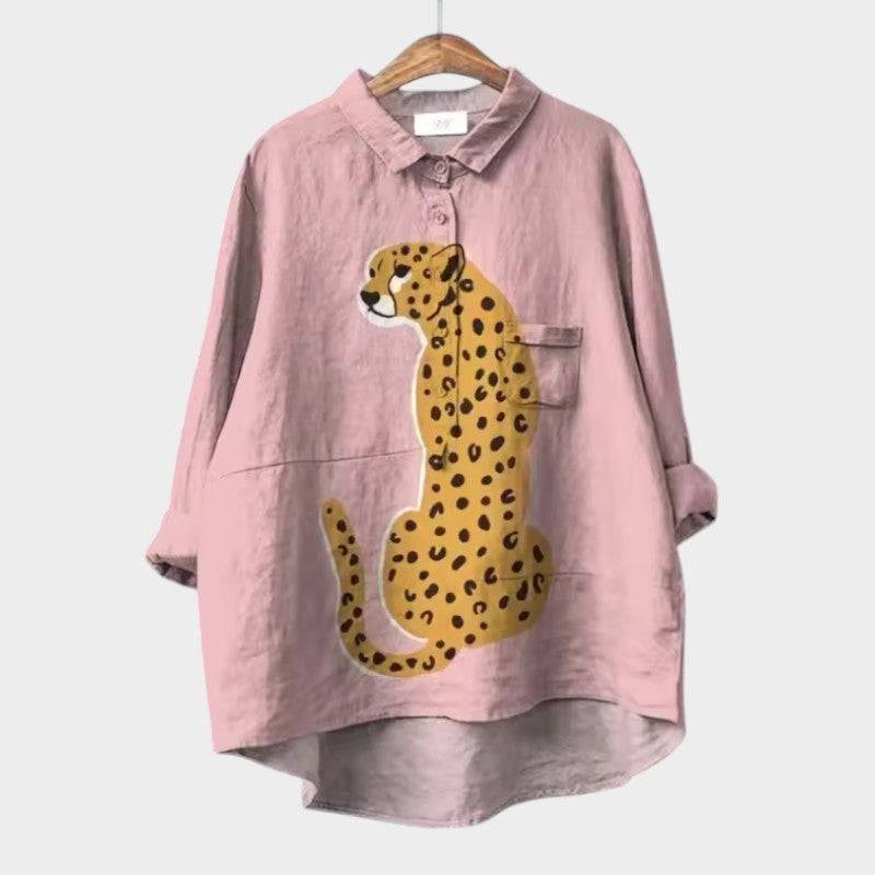 Elegant Siara™ blouse by Emma & Rose Cape Town featuring a stylish leopard print design.