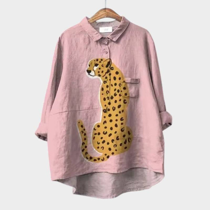 Elegant Siara™ blouse by Emma & Rose Cape Town featuring a stylish leopard print design.