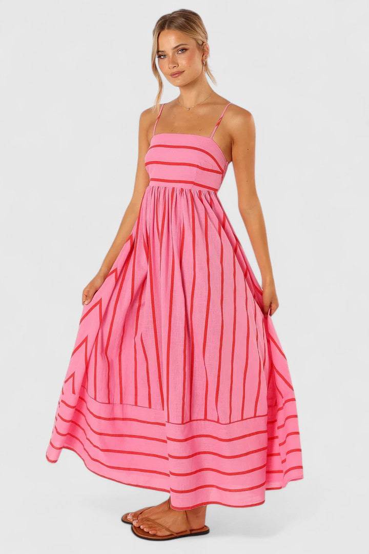Emma & Rose Cape Town Ilyanthe™ elegant pink and red maxi dress with petal and pup details, flowing and stylish for special occasions.