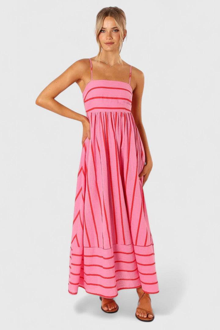 Ilyanthe™ Emma & Rose Cape Town pink and red petal maxi dress with elegant flowing fabric and floral design.