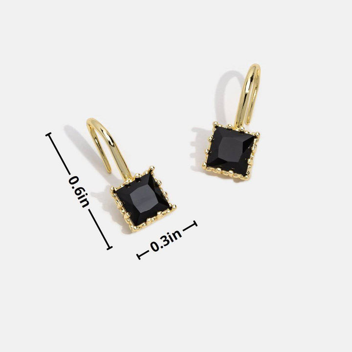 Nicole™ Crystal Drop Earrings by Emma & Rose Cape Town featuring black crystal teardrops hanging from silver hooks.