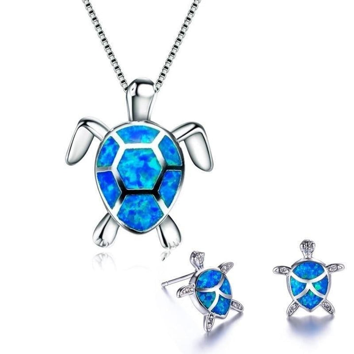 Silver earrings with opal seaweed details