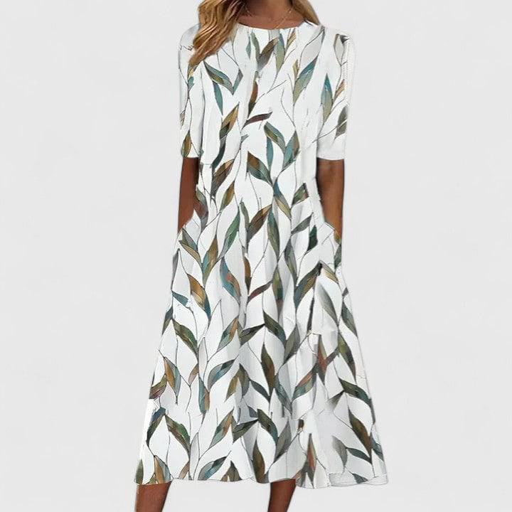 Elegant Sarah™ midi dress by Emma & Rose Cape Town, featuring a flowing fabric and stylish design perfect for special occasions.