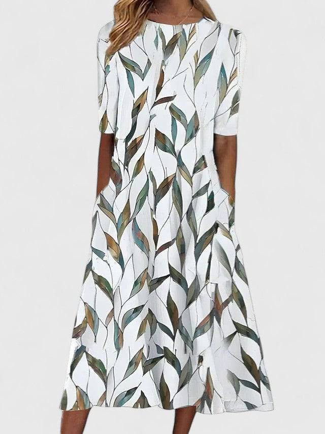 Karelieth™ Emma & Rose Cape Town sophisticated midi dress featuring a stylish pattern and elegant fit on a model.