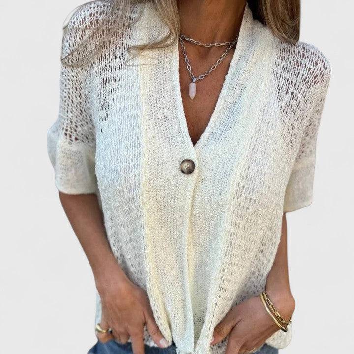 Emma & Rose Cape Town Calista™ elegant knitted blouse with long sleeves and a relaxed fit, showcased on a plain background.