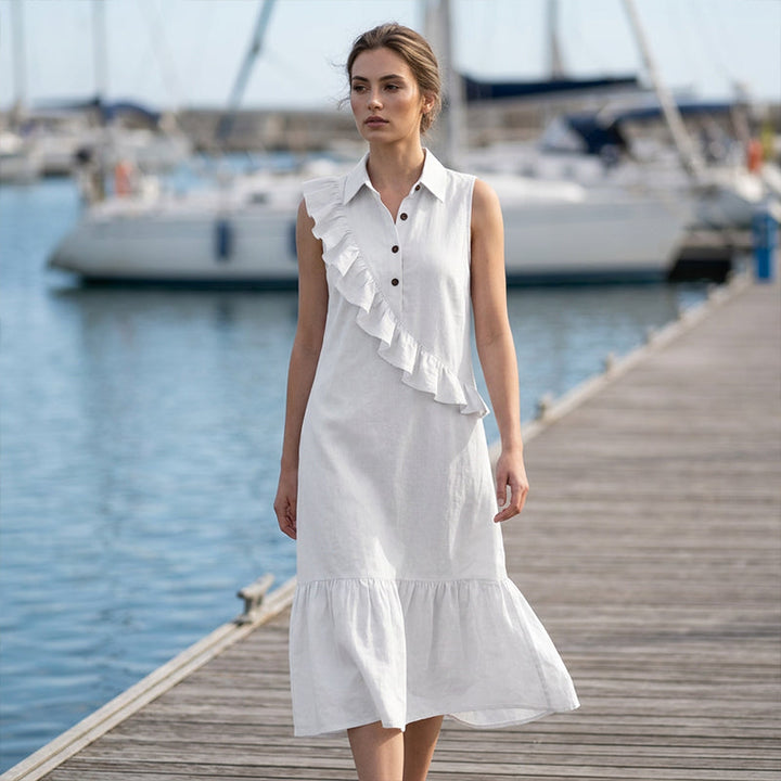 Long women's dress with asymmetric ruffles and polo collar
