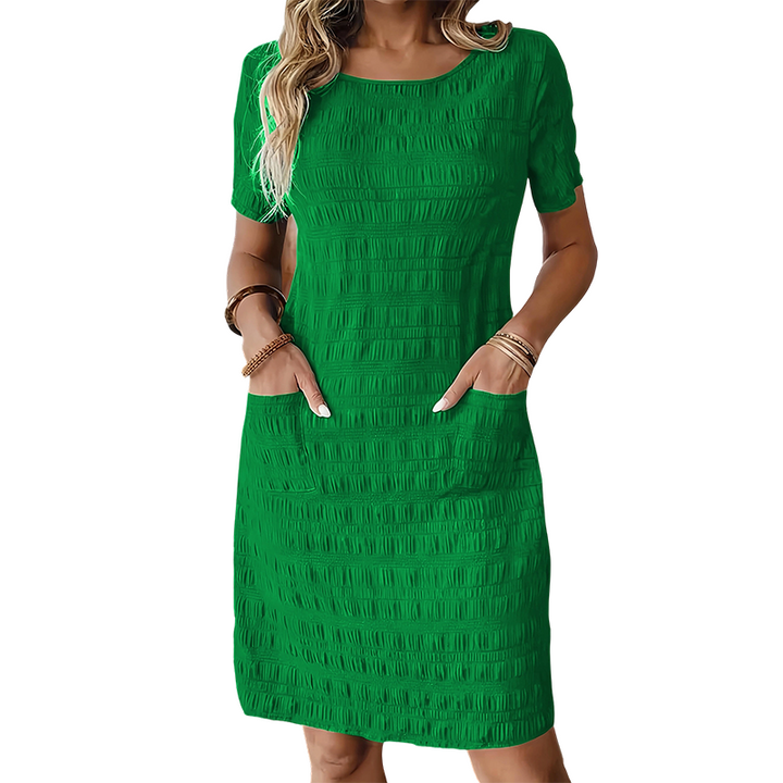 Textured women's dress with pockets and comfortable straight cut