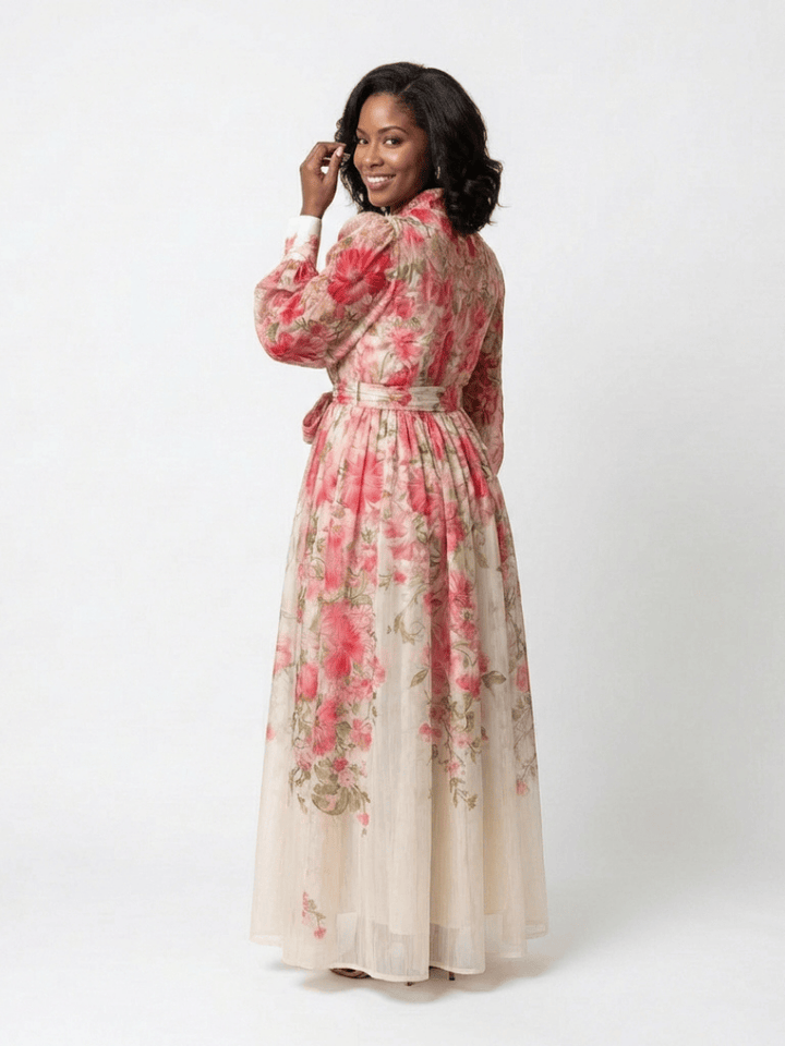 Elegant floral sheer long dress from Emma & Rose Cape Town featuring lightweight, flowing fabric and intricate floral patterns.