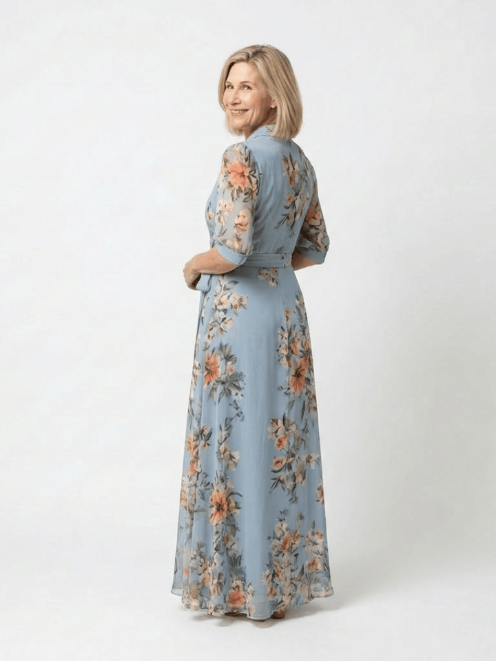 Emma & Rose Cape Town Elowen™ V Neck Maxi Dress, flowing fabric, sleeveless design, elegant silhouette, perfect for summer occasions.