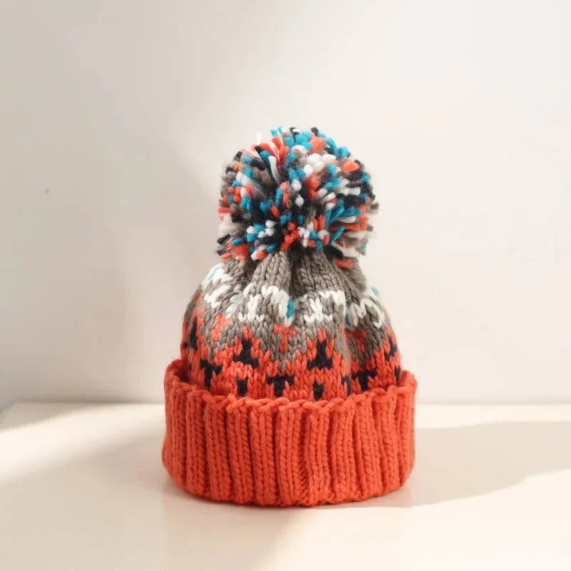 Women's Snowflake Pom-Pom Beanie with Ribbed Cuff