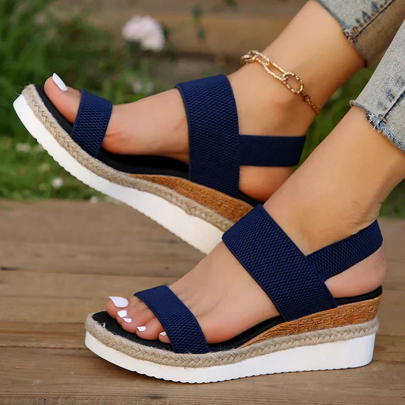 Emma & Rose Cape Town India orthopaedic sandals with woven fabric, elastic straps, and a chunky platform heel.