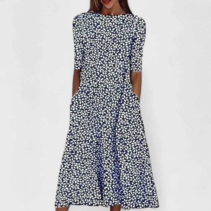 Elegant Sarah™ midi dress by Emma & Rose Cape Town, featuring a fitted silhouette and stylish neckline, shown on a model.